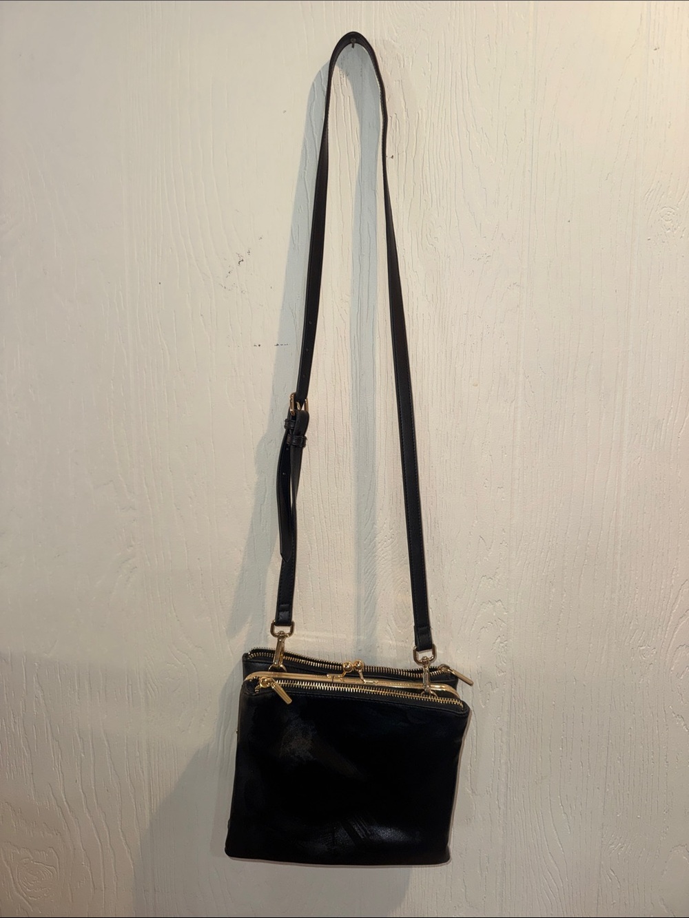 Classic Black Leather Crossbody Bag with Gold Hardware